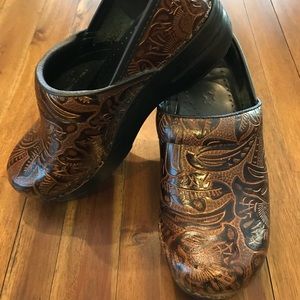 Dansko tooled leather clogs